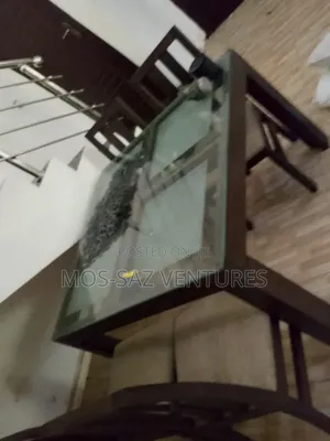 Neatly Used Glass Dinning Chair With 4 Seater