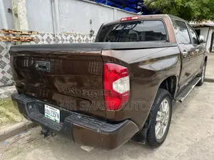 Toyota Tundra 1794 5.7L V8 w/FFV 4x4 CrewMax 5.6 ft. box 145.7 in. WB Brown