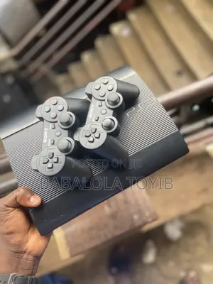 Slim Black Ps3 2pads and 15games