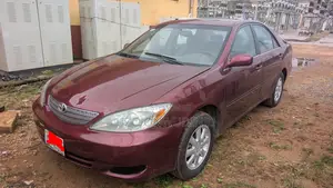 Toyota Camry LE 4dr Sedan (2.4L 4cyl 5M) 2003 Burgundy