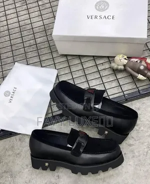 Versace Noir Titan Lug Loafers