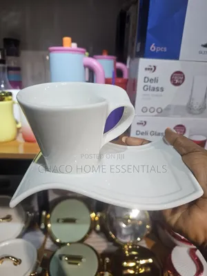 White Ceramic Wavy Tea Cup and Saucer Set (12 Pieces)