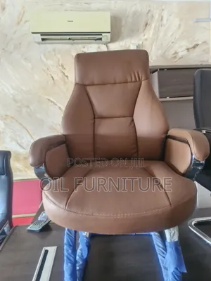 ​Luxury Executive High-Back Leather Office Chair With Padded Armrests