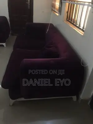One Fairly Used Sofa Chair