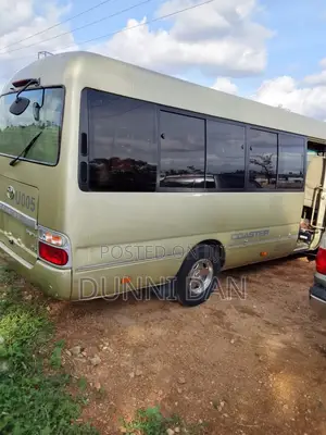 Toyota Coaster 2015 Gold