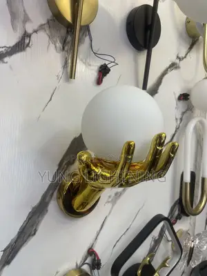 Luxury Golden Hand Wall Light – Modern LED Bedroom Sconce