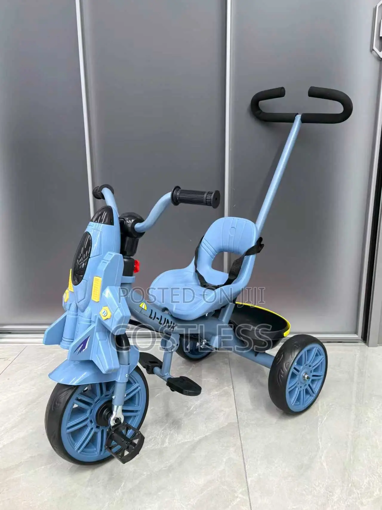 Stroller Tricycle Features an Airplane-Shaped