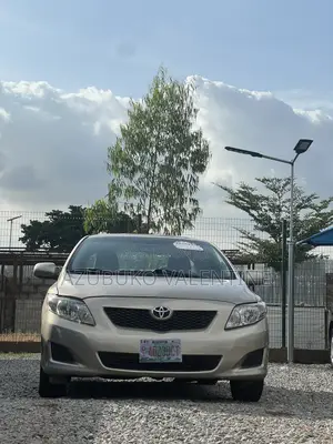 Toyota Corolla LE 4dr Sedan (1.8L 4cyl 4A) 2010 Gold
