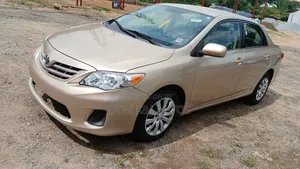 Toyota Corolla L 4dr Sedan (1.8L 4cyl 5M) 2012 Gold