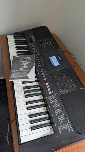 Yamaha PSR-E463 61-Key Keyboard (With Free Sustain Pedal)