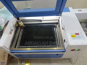 60w Co2 Laser Cutting Machine With Follow-Come Accessories