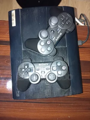 PS3 Super Slim With Two Pads and 18 Games