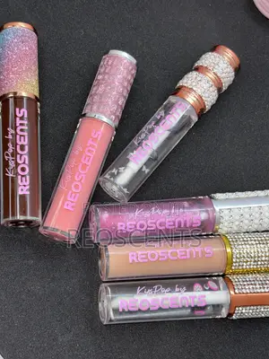 Dazzle Kiss Pop Lip Gloss. Available in Different Colours