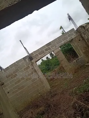 Urgent Half Plot of Land With Uncompleted Building for Sale