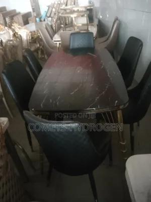 Imported 6-Seater Marble Dining Table Set With Quilted Leather Chairs