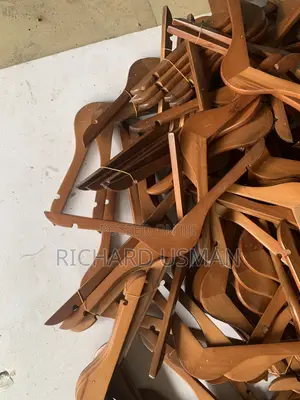 Bundles of Wooden Clothes Hangers