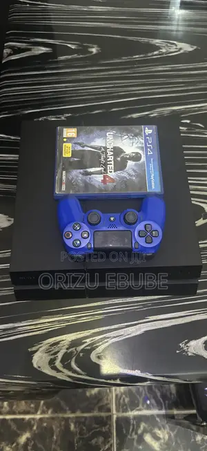 PS4 Fat 1tb With One Pad and Uncharted Cd Game