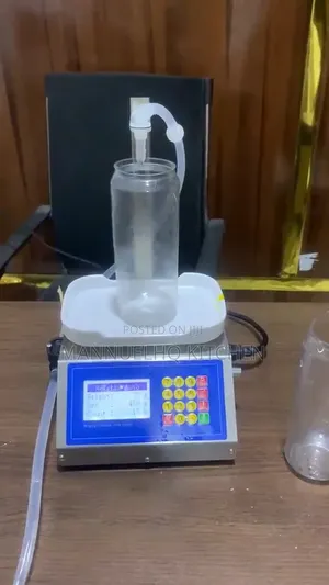Automatic Weighing Liquid Filling Machine -PET Can Bottle Dispenser