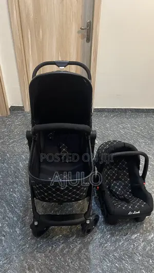 Li-Link Baby Stroller With Car Seat and Other Accessories