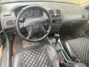 Mazda 323 1998 Gray
