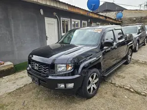 Honda Ridgeline RTL 4dr Crew Cab 4WD SB w/Leather (3.5L 6cyl 5A) 2014