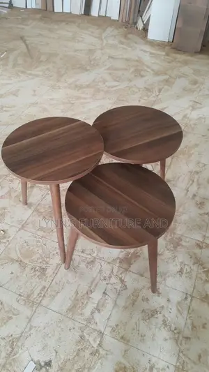 Upgrade Your Living Room With This Elegant Nesting Table Set.