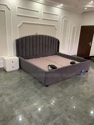 Quality Curved 7x6 Bedframe With Bedside Design