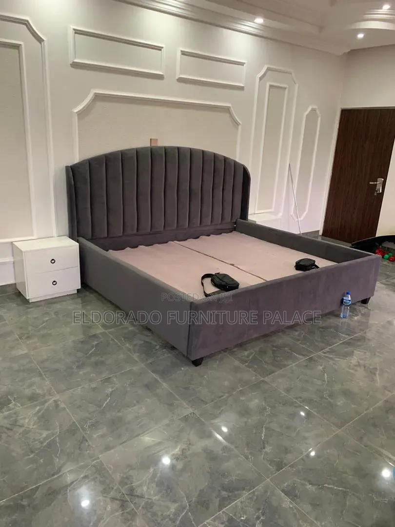 Quality Curved 7x6 Bedframe With Bedside Design