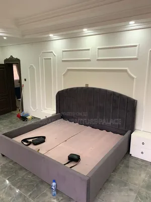 Quality Curved 7x6 Bedframe With Bedside Design