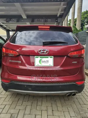 Hyundai Santa Fe Limited 4dr SUV AWD (3.3L 6cyl 6A) 2014 Red