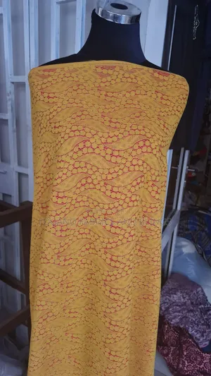 Yellow on Red Padded Lace Fabric