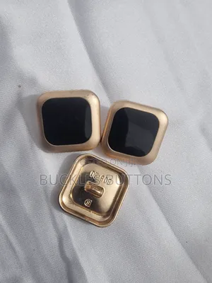 Gold and Black Metal Buttons
