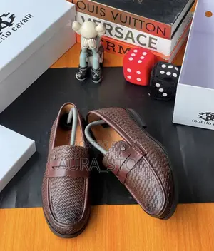 Roberto Cavalli Woven Leather Penny Loafer.