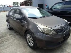 Kia Rio EX 4dr Sedan (1.6L 4cyl 6A) 2014 Brown