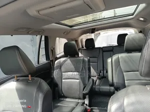 Honda Pilot Touring 4dr SUV 4WD (3.5L 6cyl 9A) 2016 Blue