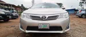 Toyota Camry LE 4dr Sedan (2.5L 4cyl 6A) 2014 Gold
