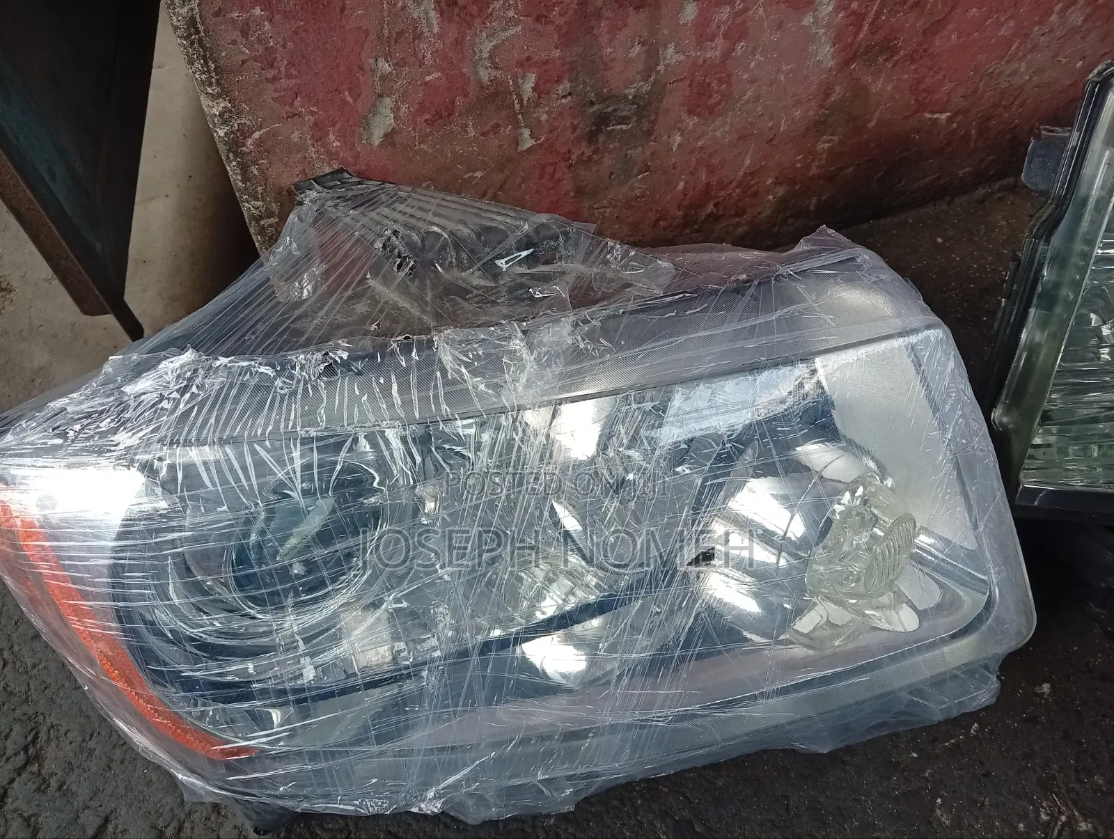 2012 Jeep Cherokee Headlight