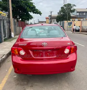 Toyota Corolla XLE 4dr Sedan (1.8L 4cyl 4A) 2009 Red