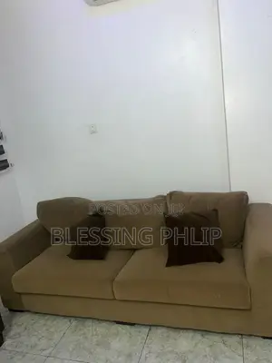 4 Seater Brown Sofa and a Side Small Table