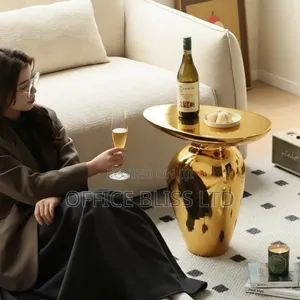 Oval Sculptural Luxury Side Table ( 50cm X32cm X 50cm) GOLD
