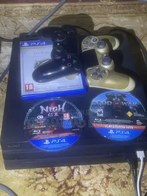 PlayStation Pro With 4 CDs and 2 Controllers