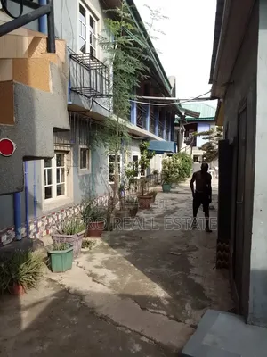 One Storey Building of 9 Units Room /Parlour and 2 Units of 2 Bedroom