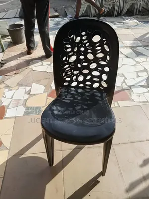 Strong Black Plastic Armless Chair With Cutout Backrest Design