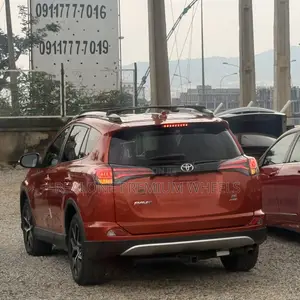 Toyota RAV4 SE AWD (2.5L 4cyl 6A) 2016 Orange