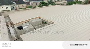 Professional Roofing Team at Work – Safety First