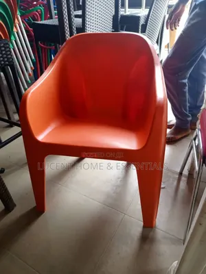 Durable Orange Tub Chair – Comfortable Plastic Armchair for Home