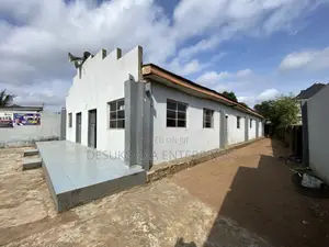 A Land Measured 100ft by 50ft With a Church Structure