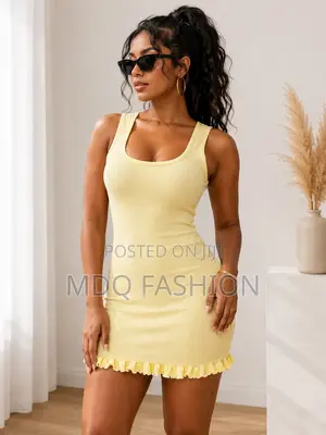 Yellow Ribbed Mini Dress With Ruffle Hem