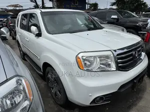 Honda Pilot Touring w/RES/Navi 4WD (3.5L 6cyl 5A) 2013 White