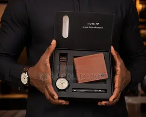 TOMI MENS PACKAGE SET ( With Pen , Wallet and a Nice Leather Watch )
